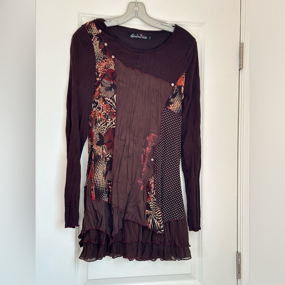 This is a Brown Dress with pretty patterns. Size 2. The brand is C Fait PourVous